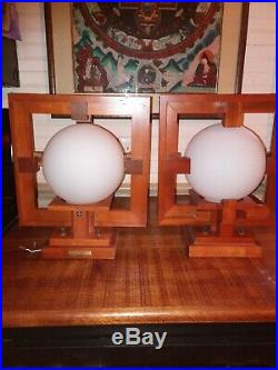 Lights. Pair of Frank Lloyd Wright globe wall sconces used in good condition