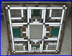 Vintage stained glass window in style of Frank Lloyd Wright